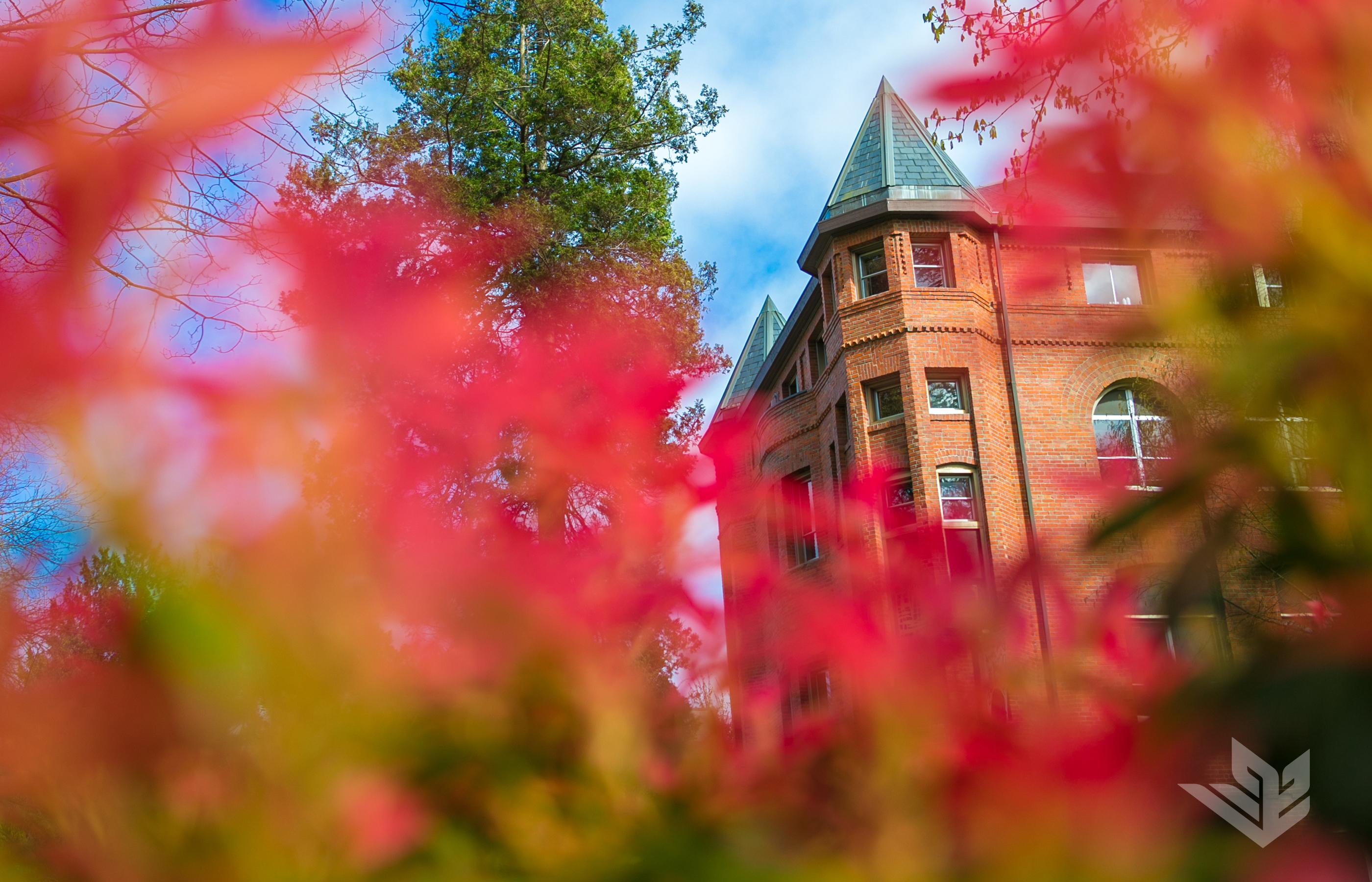 An autumn image of Alexander and Adelaide Hall, built in 1891, at Seattle Pacific University. 